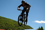 Mountain Biker Over Grass