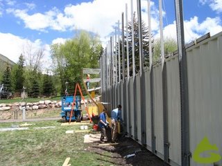 Sun shines on climbing wall construction for Teva Mountain Games